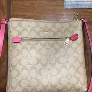 Coach Rowan messenger purse in beige with pink trim